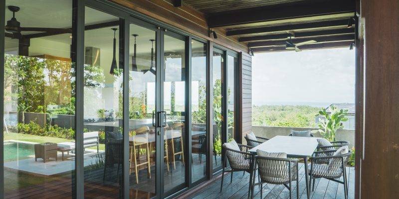 Custom-designed teak furniture in luxury Bali villa interior