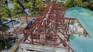 Ongoing Merbau roof installation by Touchwood crew in tropical Seychelles