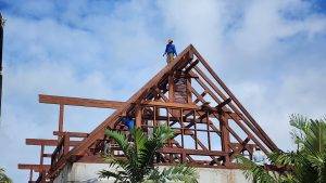 Ongoing installation of Merbau wood roofing in Seychelles by Touchwood crew