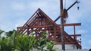 Ongoing installation of Merbau wood roofing in Seychelles by Touchwood crew